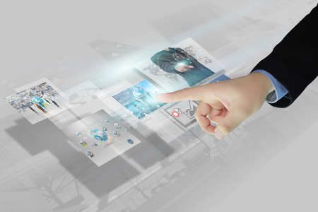 Businessman press virtual screen.business concept,technologyの写真素材