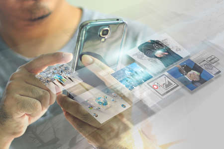 Businessman press virtual screen.business concept,technologyの写真素材