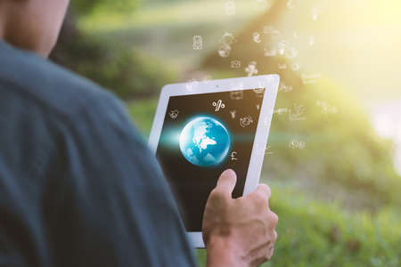 Globalization business concept.Businessman using digital tablet.の写真素材