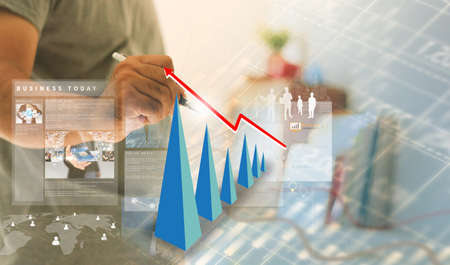 Businessman write business graph.の写真素材