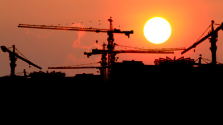 Blurred construction site background.