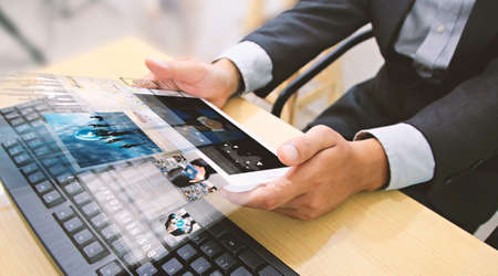 Businessman using tablet.virtual screen.business conceptの写真素材
