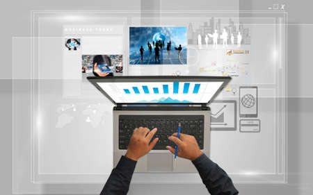 Businessman using laptop.Social media concept.の写真素材