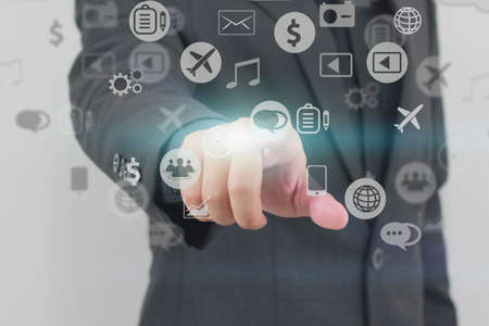Businessman touch social media icons.の写真素材