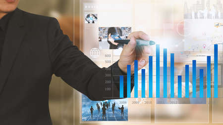 Businessman drawing graph,Businessman analysis graph financial.の写真素材