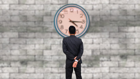 businessman looking at the clock.の写真素材
