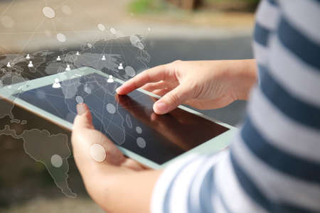 woman hands holding tablet.Social network concept.の写真素材