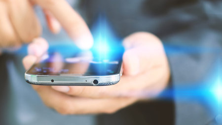 Hand touch screen smart phone . Social media concept.の写真素材