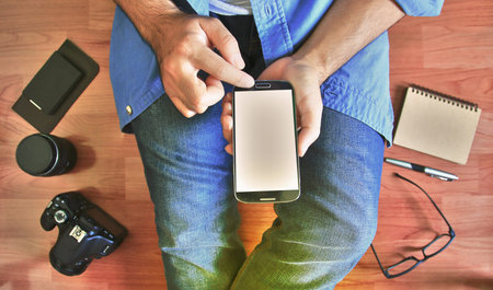 Man hand touch screen smart phone.の写真素材