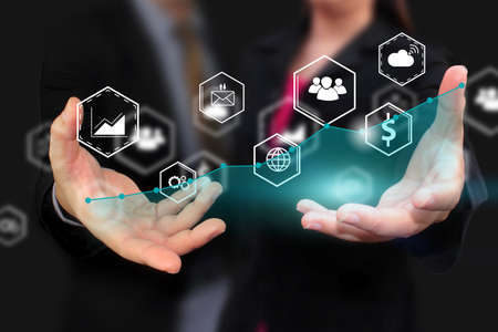 Business team holding social icons.business concept.social media conceptの写真素材