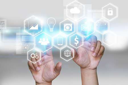 Hand touch screen Social media icons.Digital technology concept,Social media,social networkの写真素材
