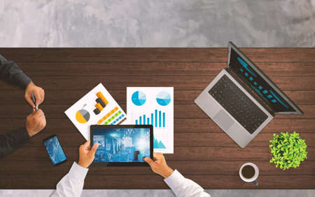 Business team working and analysis financial paperwork , business graph, planning,working at office desk.の写真素材