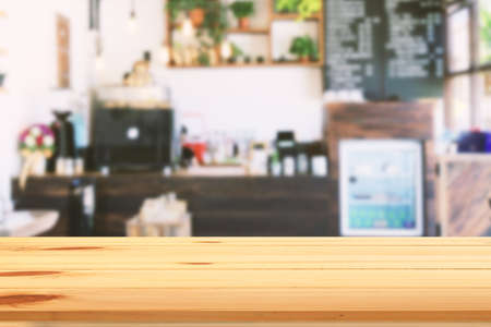 View from wooden table in coffee shop. blurred backgroundの写真素材