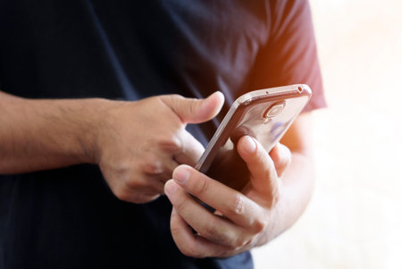 Man login with fingerprint scanning technology.  fingerprint to identify personal                   ...