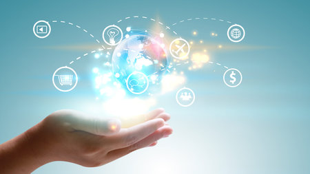 Hand holding world with social media icons.の写真素材