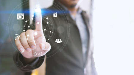 Businessman touch screen icons . Cloud computing conceptの写真素材