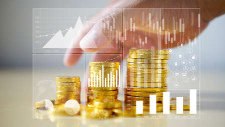 Businessman holding money coins. Business Growth concept.の写真素材