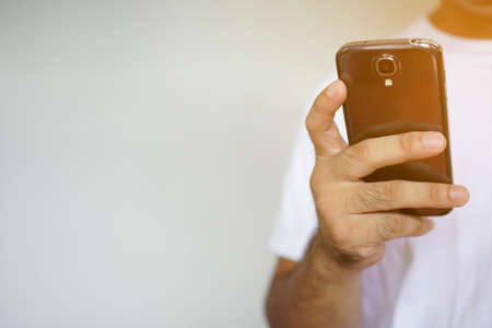 A man using smartphone.                               の写真素材