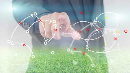 Football manager with soccer field and bright spotlights. 