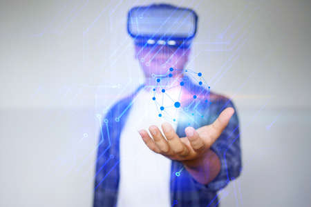 Young man wearing virtual reality glasses ,Virtual reality concept   の写真素材