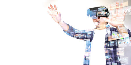 Young man wearing virtual reality glasses. VR glassesの写真素材