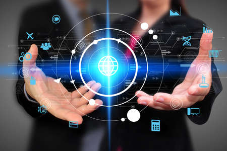Business team holding icons interface on screen, Social media conceptの写真素材