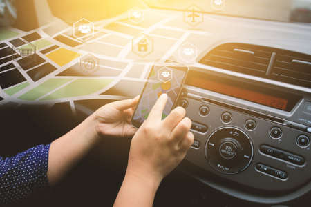 Hand touch screen smart phone. Application icons interface on screen. Social media conceptの写真素材