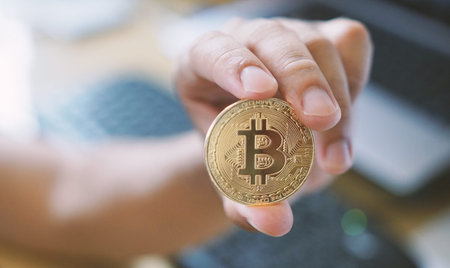 hand holding bitcoin. crypto currency, Financial Internet Technology Concept.                       ...