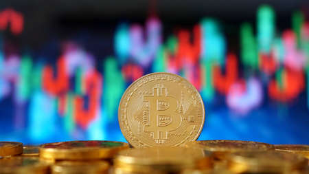 Bitcoin symbol. Financial graph background, crypto currency.       の写真素材