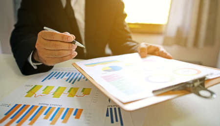 Businessman working in the office. business report graphs                               の写真素材