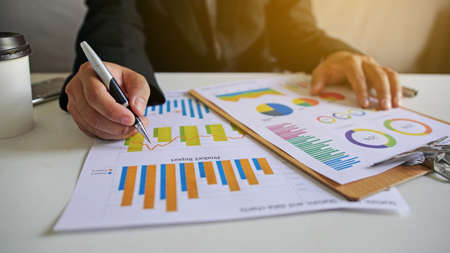 Businessman working in the office. business report graphs                               の写真素材