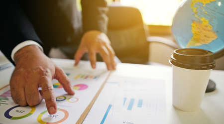 Businessman working in the office. business report graphs                               の写真素材
