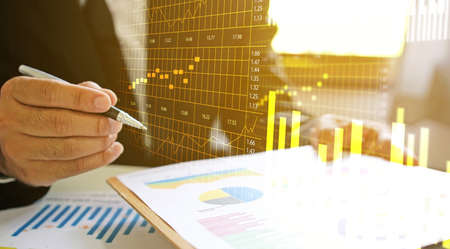 Businessman working in the office. analysis financial diagram, Business report graphs                      の写真素材