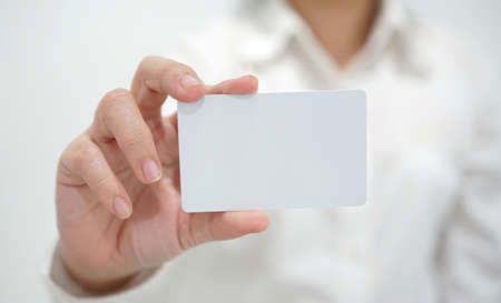 Businesswoman showing business card.                               の写真素材