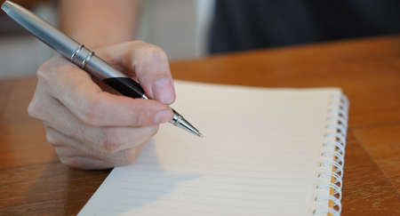 sman writing document.の写真素材