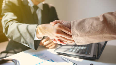 Businessman hand shake, corporate business successful.の写真素材