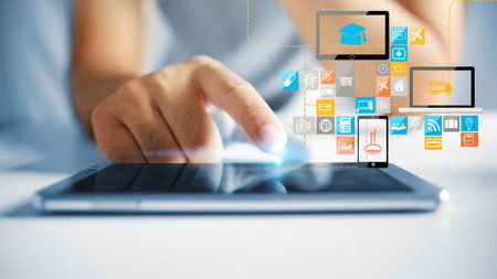 hand presses social media icons on screen digital tablet 