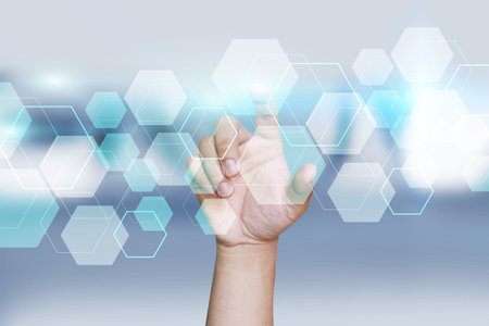 man pressing virtual button on screen interface