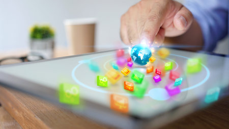 hand presses social media icons on screen digital tablet