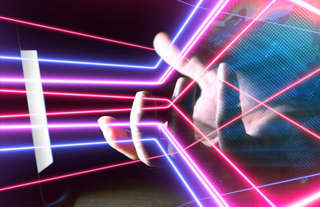 Man using smartphone with neon light coming out