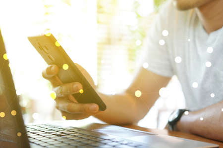 hand touch screen smartphone. social network concept    の写真素材