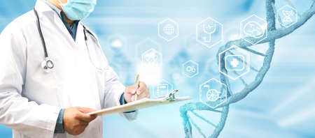 Doctor working in hospital and icon medical interface. Medical technology research institute conceptの写真素材