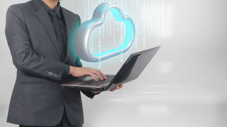 Businessman transfer data to cloud storage. Cloud computing technology conceptの写真素材