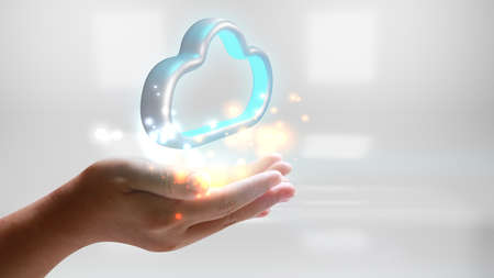 hands holding the cloud computing symbolの写真素材