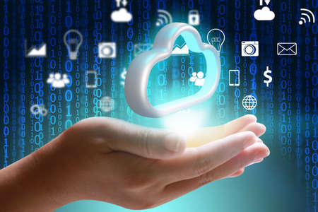 hands holding the cloud computing symbolの写真素材