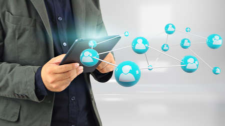 Hand using tablet connecting, Social network conceptの写真素材
