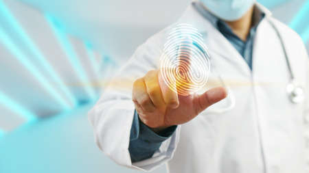 Doctor login with fingerprint scanning technology. fingerprint to identify personal, security system conceptの写真素材