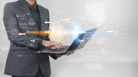Businessman using laptop connecting to internet, Social network concept.の写真素材