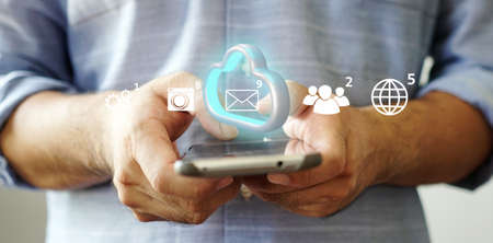 Social media and notification icons on smartphone. Media marketing concept.の写真素材