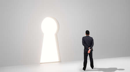 Businessman looking through key hole. Concept of success, 3d renderingの写真素材